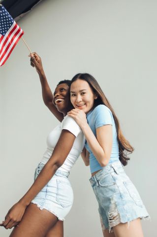 Women in Denim Shorts Smiling